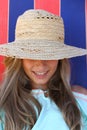 Smiling teen girl in hat on beach Royalty Free Stock Photo