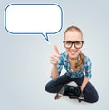 Smiling teen girl sitting on floor with tablet pc Royalty Free Stock Photo