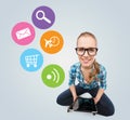 Smiling teen girl sitting on floor with tablet pc Royalty Free Stock Photo