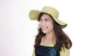 Smiling teen girl wearing lime green hat