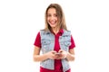 Smiling teen woman using smartphone Royalty Free Stock Photo