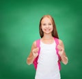 Smiling teenage girl in blank white tank top Royalty Free Stock Photo