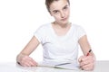 Smiling teenage girl with copy book and pencil Royalty Free Stock Photo