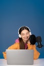 Smiling teenage girl in headphones looking Royalty Free Stock Photo