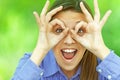 Smiling teenage girl shows glasses