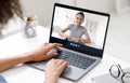 Smiling teenage girl student on laptop screen studying remotely and millennial woman tutor working at home Royalty Free Stock Photo