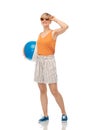 Smiling teenage girl in sunglasses with beach ball Royalty Free Stock Photo