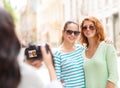 Smiling teenage girls with camera Royalty Free Stock Photo