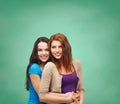 Smiling teenage girls hugging Royalty Free Stock Photo