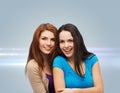 Smiling teenage girls hugging Royalty Free Stock Photo