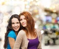 Smiling teenage girls hugging Royalty Free Stock Photo