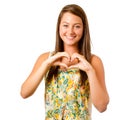 Smiling teenager girl making heart shape Royalty Free Stock Photo