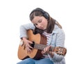 Smiling teenager girl playing acoustic guitar Royalty Free Stock Photo