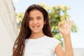 Smiling teenager girl saying ok Royalty Free Stock Photo