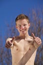 Smiling teenager posing thumbs up Royalty Free Stock Photo