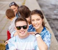 Smiling teenagers in sunglasses having fun outside Royalty Free Stock Photo