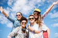 Smiling teenagers in sunglasses having fun outside Royalty Free Stock Photo