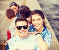 Smiling teenagers in sunglasses having fun outside Royalty Free Stock Photo