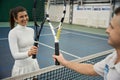 Smiling tennis players man and woman with rocket Royalty Free Stock Photo