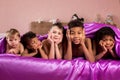 Smiling tired kids on bed. Royalty Free Stock Photo