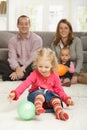 Smiling toddler with ball