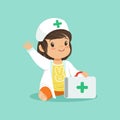 Smiling toddler girl holding medical suitcase and waving hand. Cartoon baby character wearing in doctor s coat and hat Royalty Free Stock Photo