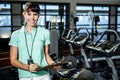 Smiling trainer holding clipboard