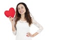 Smiling valentines day woman showing a red heart Royalty Free Stock Photo