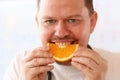Smiling Vegan Chef Eating Tropical Fruit Portrait Royalty Free Stock Photo
