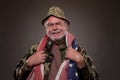 Smiling Vietnam Veteran with American flag