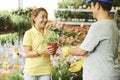 Woman selling flowers Royalty Free Stock Photo