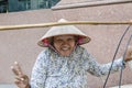 Smiling Vietnamese street hawker