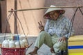 Smiling Vietnamese street hawker