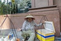 Smiling Vietnamese street hawker