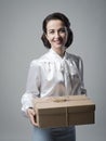 Smiling vintage woman with mail package Royalty Free Stock Photo