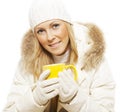 Smiling winter woman holding hot tea Royalty Free Stock Photo