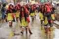 Smiling witches under rain at Carnival parade, Stuttgart