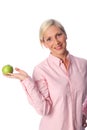 Smiling woman with an apple Royalty Free Stock Photo