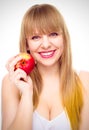 Smiling woman with apple isolated