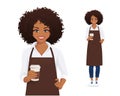 Smiling woman in apron holding coffee