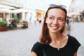 Smiling Woman on the Background of European Old Town Street. Ljubljana, Slovenia Royalty Free Stock Photo