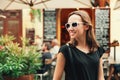 Smiling Woman on the Background of European Old Town Street. Ljubljana, Slovenia Royalty Free Stock Photo