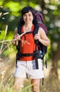 Smiling woman with backpack