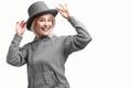 Smiling woman. Beautifu youngl woman wearing gray hat and in a gray sweatshirt Royalty Free Stock Photo