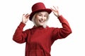 Smiling woman. Beautifu youngl woman wearing red hat and in a red sweatshirt Royalty Free Stock Photo
