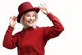 Smiling woman. Beautifu youngl woman wearing red hat and in a red sweatshirt Royalty Free Stock Photo