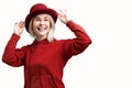 Smiling woman. Beautifu youngl woman wearing red hat and in a red sweatshirt Royalty Free Stock Photo