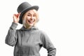 Smiling woman. Beautifu youngl woman wearing gray hat and in a gray sweatshirt Royalty Free Stock Photo