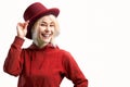 Smiling woman. Beautifu youngl woman wearing red hat and in a red sweatshirt Royalty Free Stock Photo