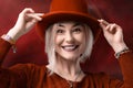 Smiling woman. Beautifu youngl woman wearing red hat and in a red sweatshirt. Young woman with beautiful smile happy and excited Royalty Free Stock Photo